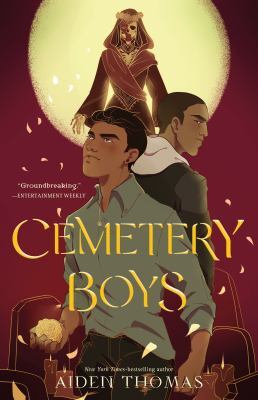 illustrated cover of cemetery boys by aiden thomas, featuring three boys: one with a determined expression, another looking away, and a glowing skeletal figure in a cloak above them, with golden leaves falling around.