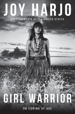 black and white cover of girl warrior by joy harjo, featuring a woman in traditional attire standing in the ocean with waves splashing around her, under dramatic cloudy skies. text highlights harjo as u.s. poet laureate.