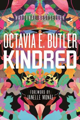 Book cover of Kindred by Octavia E. Butler, featuring bold white text over a vibrant, abstract background with pink, orange, green, and black shapes. Foreword by Janelle Monáe is noted at the bottom.