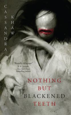 a ghostly figure with long black hair, a featureless pale face except for a wide red mouth, and wearing a white robe is shown on the cover of nothing but blackened teeth by cassandra khaw.