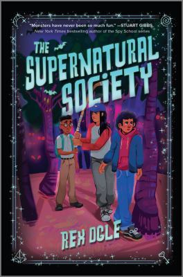 book cover for the supernatural society by rex ogle. three kids stand in a glowing, magical forest with swirling purple trees. the title is large and glowing, and stars decorate the border.
