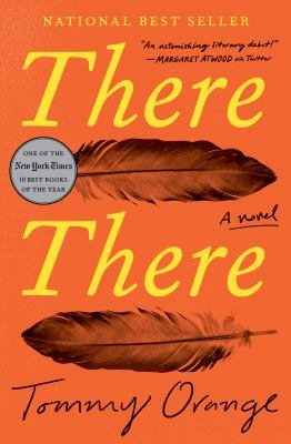 the cover of there there by tommy orange features two large brown feathers on an orange background, with the title in yellow text and a silver sticker noting it as a new york times best seller.